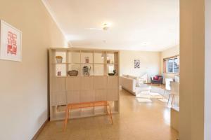 a living room with a couch and a table at BmyGuest - Santa Catarina Light Apartment in Porto