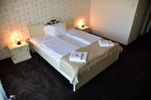 Uma cama ou camas num quarto em Hesteya Hotel