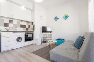Kuchyň nebo kuchyňský kout v ubytování FLH Marquês Modern Flat + 7 fotografií