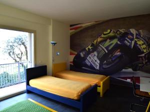 A bed or beds in a room at Rental rooms Antonella
