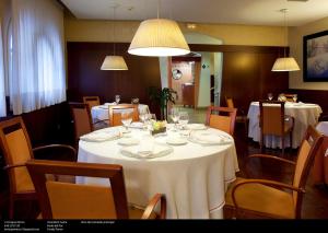 TV a/nebo společenská místnost v ubytování Hotel Torres Manlleu