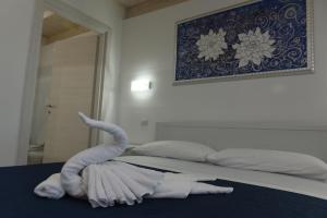 Posteľ alebo postele v izbe v ubytovaní B&B LADY JOLANDA