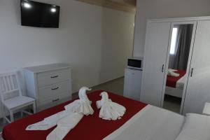 Posteľ alebo postele v izbe v ubytovaní B&B LADY JOLANDA
