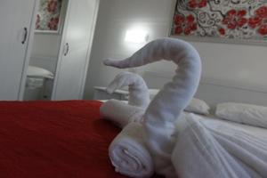 Posteľ alebo postele v izbe v ubytovaní B&B LADY JOLANDA