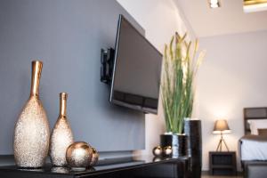 Televízia a/alebo spoločenská miestnosť v ubytovaní Jasna SportHotel & SPA