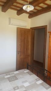 Posteľ alebo postele v izbe v ubytovaní Vecchio Baglio Cofano