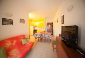 A television and/or entertainment centre at LE NOBILI DIMORE - appartamenti a Gallipoli