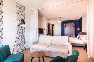 Posezení v ubytování Baya Hotel