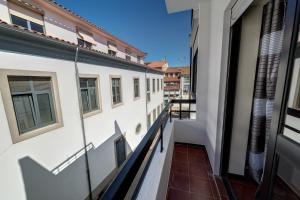 a view from the balcony of a building at Bragança Apartments in Bragança