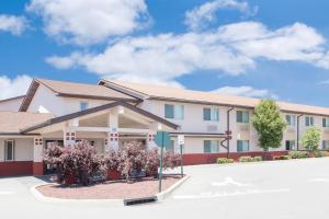 a rendering of a building at a hospital at Super 8 by Wyndham Middletown in Middletown