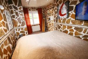 Ένα ή περισσότερα κρεβάτια σε δωμάτιο στο Villa Casper