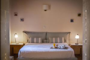 Posteľ alebo postele v izbe v ubytovaní Veneto Boutique Hotel