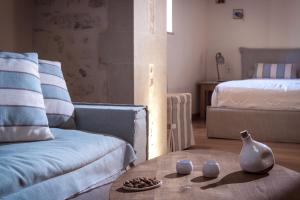 Posteľ alebo postele v izbe v ubytovaní Veneto Boutique Hotel