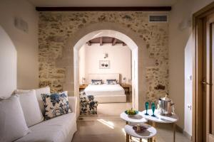 Posteľ alebo postele v izbe v ubytovaní Veneto Boutique Hotel