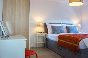 Кровать или кровати в номере Apartments Bego Spa & Wellness +170 фотографий