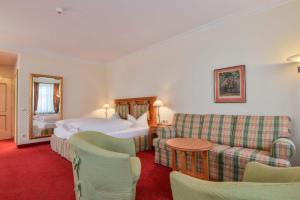 Postel nebo postele na pokoji v ubytování Hotel Post Murnau