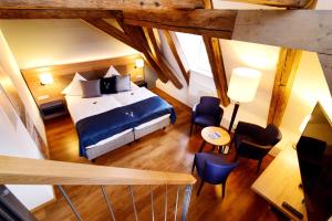 Postel nebo postele na pokoji v ubytování Hotel Alte Vogtei