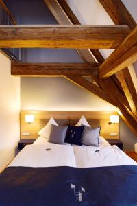 Postel nebo postele na pokoji v ubytování Hotel Alte Vogtei
