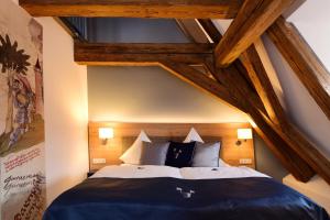 Postel nebo postele na pokoji v ubytování Hotel Alte Vogtei