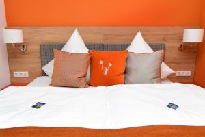 Postel nebo postele na pokoji v ubytování Hotel Alte Vogtei