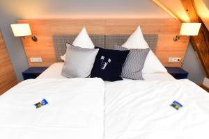 Postel nebo postele na pokoji v ubytování Hotel Alte Vogtei