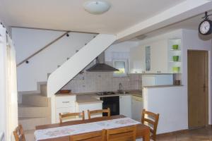 Kuchyňa alebo kuchynka v ubytovaní Gospodar Apartments