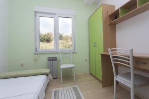 Posteľ alebo postele v izbe v ubytovaní Gospodar Apartments