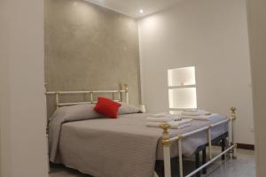 Postel nebo postele na pokoji v ubytování Residenza San Tomaso
