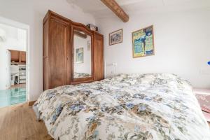 A bed or beds in a room at La Casina