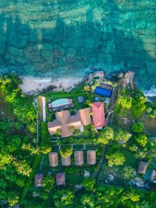an aerial view of a resort by the water at Twilight Ceningan in Nusa Lembongan +93 photos