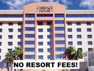 a building with a no resort fees sign in front of it at The Carriage House in Las Vegas