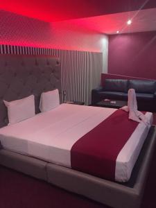 Ένα ή περισσότερα κρεβάτια σε δωμάτιο στο Intimisimo Autohotel Adults Only Ciudad Industrial