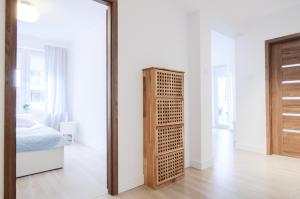 Posteľ alebo postele v izbe v ubytovaní Apartament z basenem Polanki