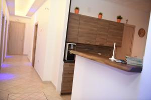 Kuchyň nebo kuchyňský kout v ubytování la casa di asmei b & b Lucera
