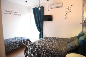 Postel nebo postele na pokoji v ubytování la casa di asmei b & b Lucera
