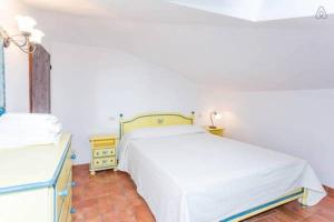 Postel nebo postele na pokoji v ubytování Principe Del Trasimeno
