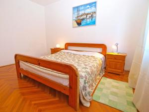 Ein Bett oder Betten in einem Zimmer der Unterkunft Apartments Duilija 1301