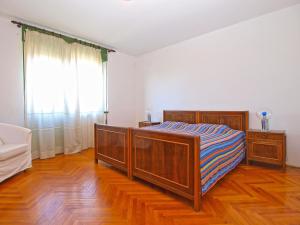 Ein Bett oder Betten in einem Zimmer der Unterkunft Apartments Duilija 1301