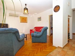 Ein Sitzbereich in der Unterkunft Apartments Duilija 1301