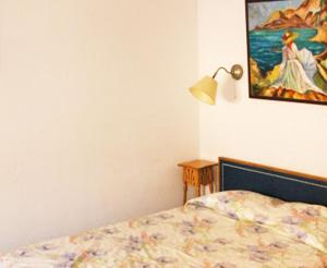 Postel nebo postele na pokoji v ubytování Hotel Comodoro