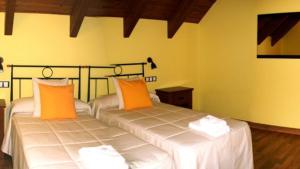Postel nebo postele na pokoji v ubytování Hostal Rural Casa Parda