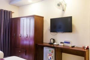 TV a/nebo společenská místnost v ubytování Ailen Garden 2 Hotel