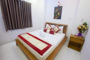 Postel nebo postele na pokoji v ubytování Ailen Garden 2 Hotel