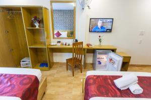 Postel nebo postele na pokoji v ubytování Ailen Garden 2 Hotel