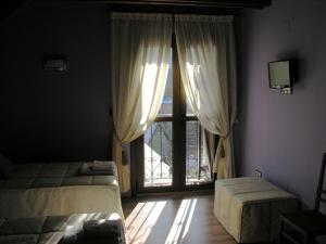 Posezení v ubytování Hostal Rural Casa Parda