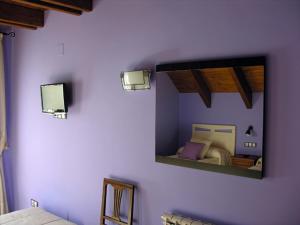 Postel nebo postele na pokoji v ubytování Hostal Rural Casa Parda