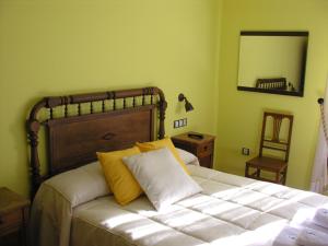 Postel nebo postele na pokoji v ubytování Hostal Rural Casa Parda