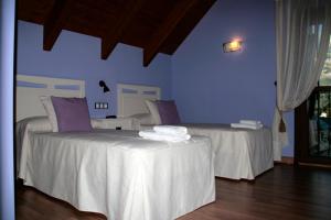 Postel nebo postele na pokoji v ubytování Hostal Rural Casa Parda