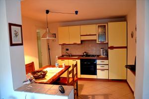 Kuchyň nebo kuchyňský kout v ubytování Casa Romantica