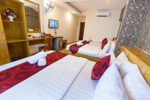 Postel nebo postele na pokoji v ubytování Ailen Garden 2 Hotel